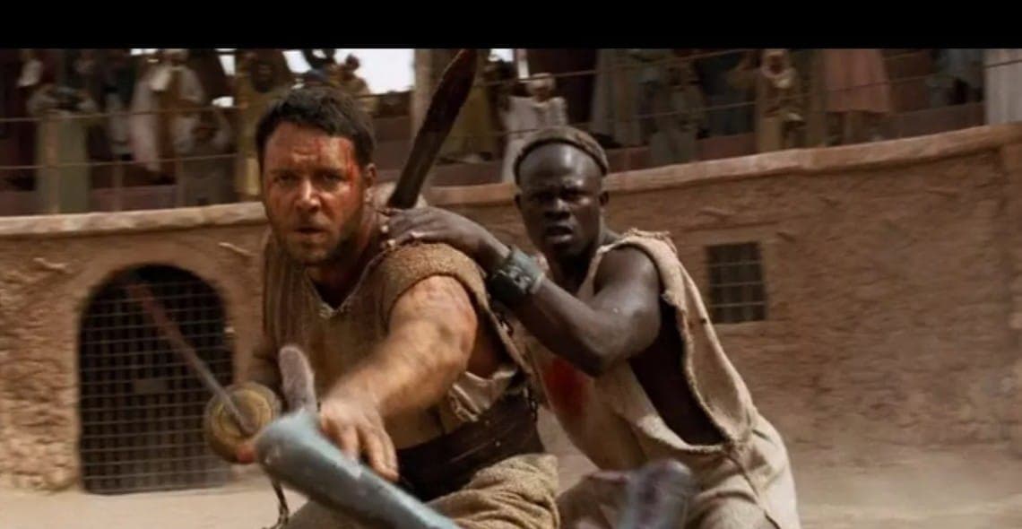 Схватка с дикими зверями на арене. Кадр из фильма "Гладиатор". Scott Free Productions, Red Wagon Entertainment, 2000